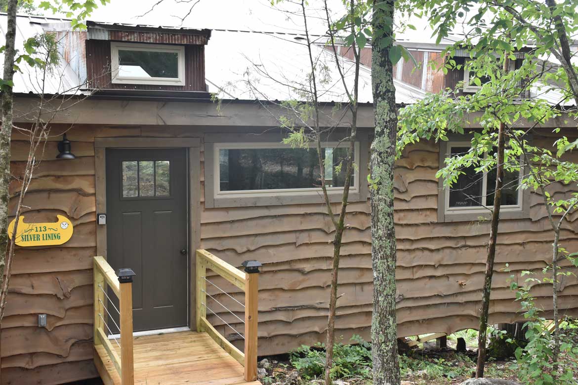 View of a rustic Ozark Mountain rental cabin exterior